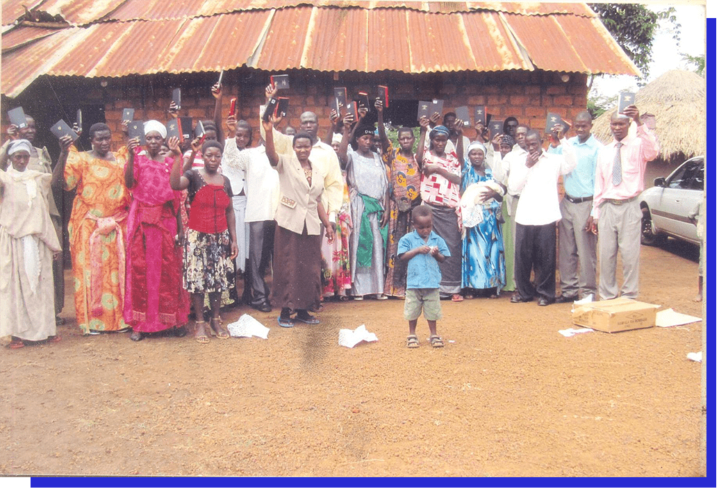 Group of People With Bible On Hand